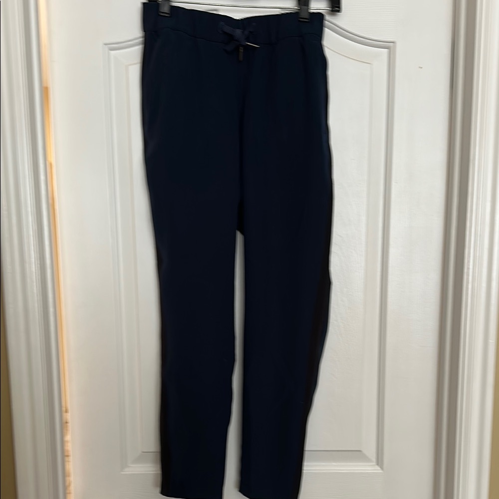 Lululemon On the Fly Woven Navy Blue Pants w/Black Side Stripe